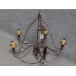 An antique style twisted brass five branch chandelier with a gilded finish. H.60 W.65cm