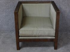 A contemporary cubiform framed armchair. H.71 W.71 D.71cm