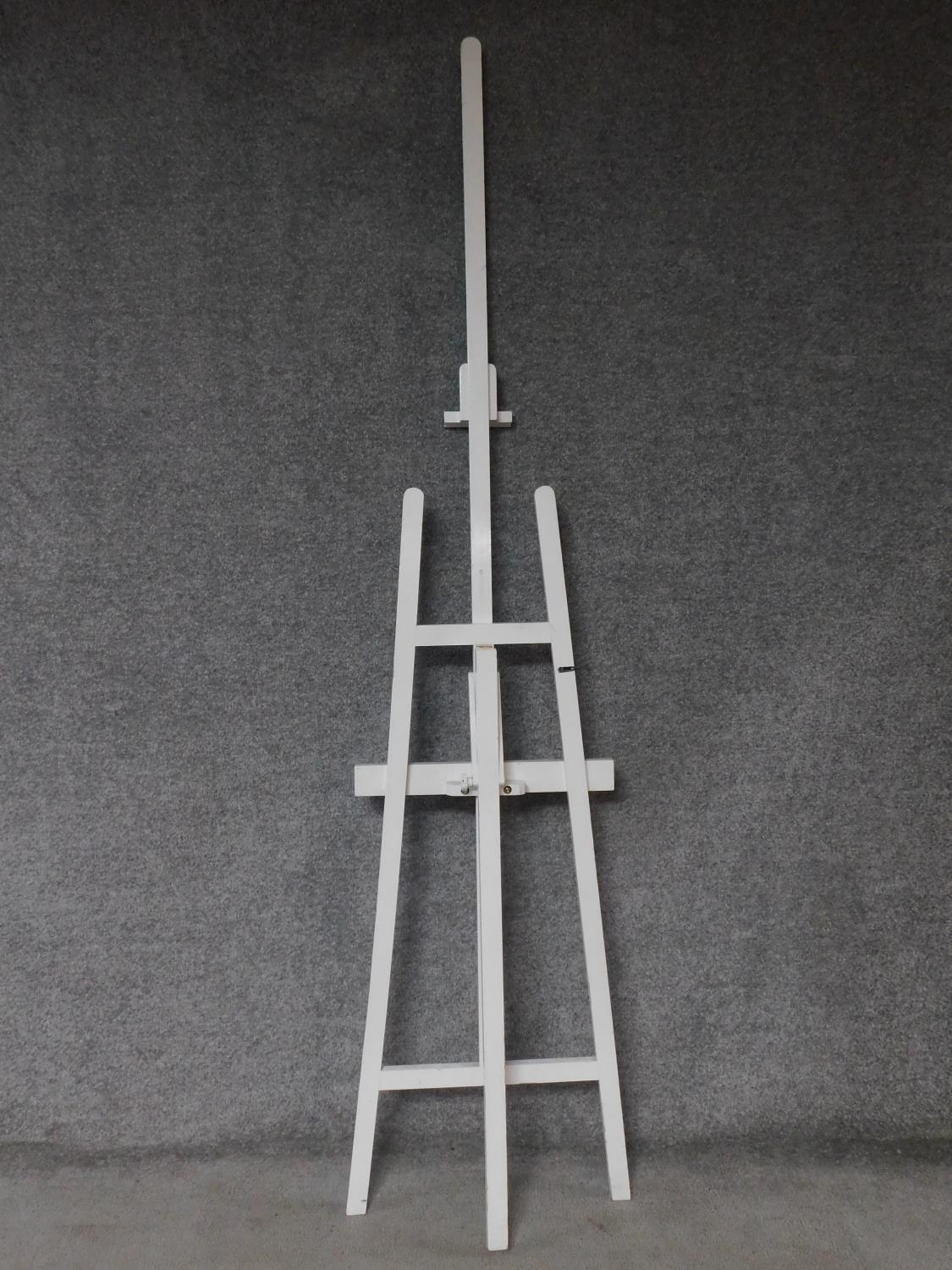 A Windsor & Newton white painted adjustable easel. 222x56cm - Image 3 of 3