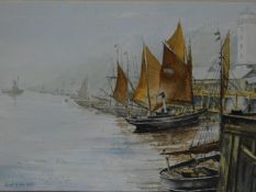 A framed and glazed watercolour depicting sailing boats in a port, signed by John Main, 1995.