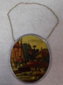 A vintage 'De Timmerman' stained glass oval hanging sun catcher. 24x21cm