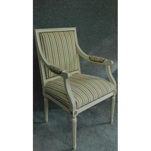 A Louis XVl style painted white armchair in striped upholstery and raised on tapering fluted - Image 2 of 7