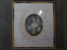 An antique ivory/bone and tortoiseshell framed painted miniature on ivory of an aristocratic lady,