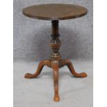 A Georgian style mahogany lamp table on tripod cabriole supports. H.56cm