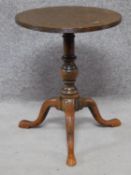 A Georgian style mahogany lamp table on tripod cabriole supports. H.56cm