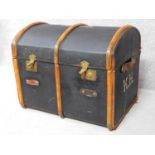 An antique teak and brass bound steamer trunk with twin leather carrying handles. H.62 W.80 D.53cm