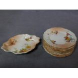 A set of eleven 1898 Royal Worcester hand painted floral design on blush ivory porcelain dinner