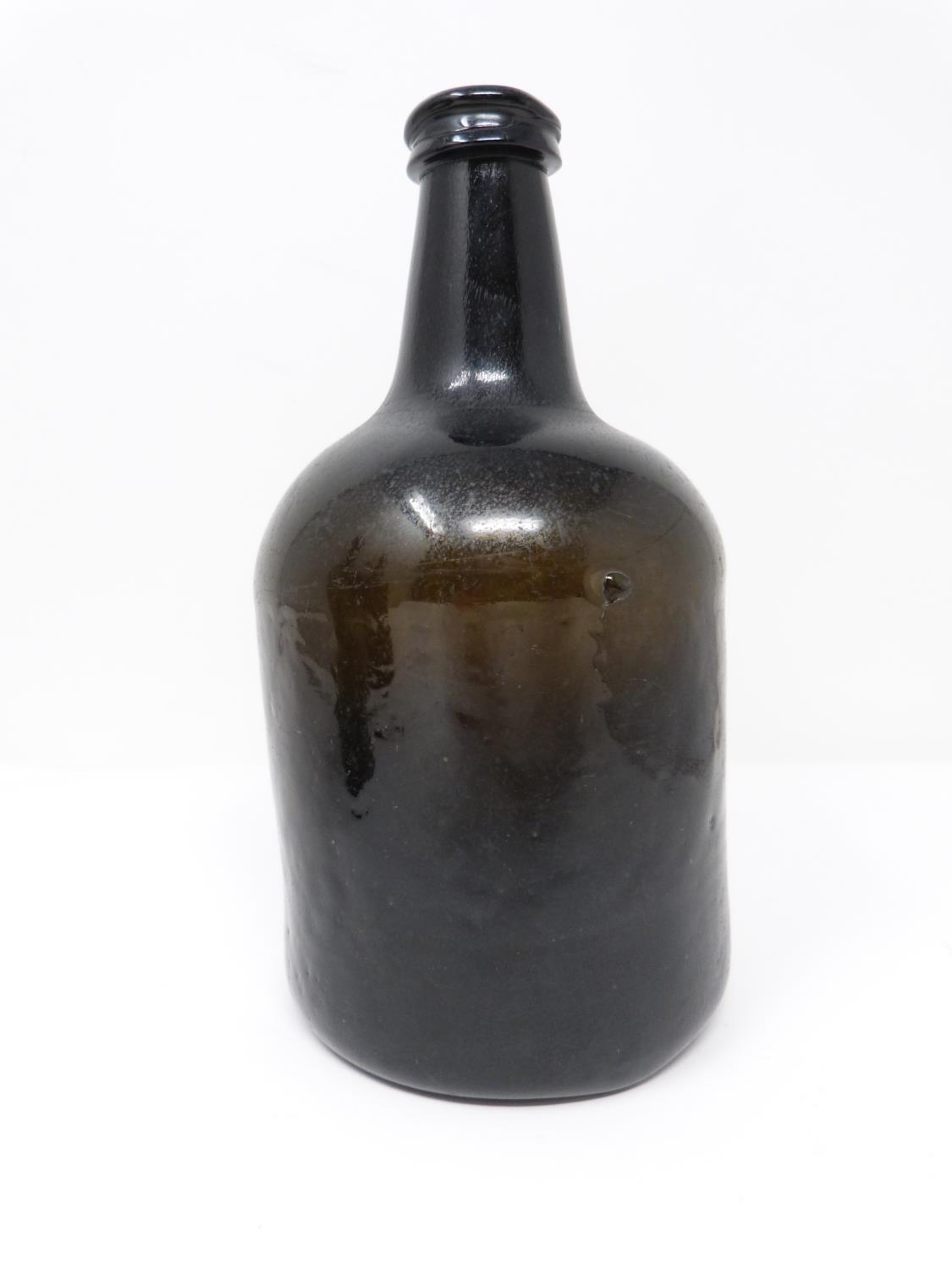 Three 18th century glass wine bottles. Two brown mallet shaped bottles and one green cylindrical - Image 7 of 8