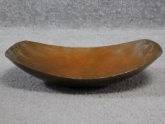 A vintage hammered copper bowl. Pyramid makers stamp to the base. 26x22cm