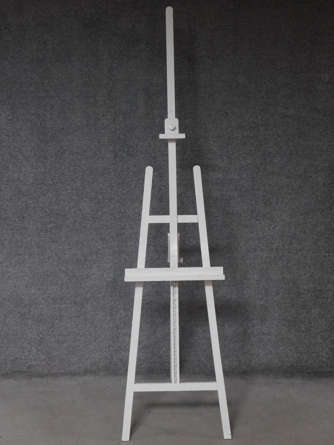 A Windsor & Newton white painted adjustable easel. 222x56cm - Image 2 of 3