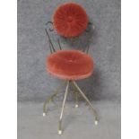 A vintage brass framed velvet upholstered dressing table chair on revolving base. H.85cm