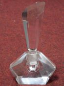 An Art Deco faceted crystal geometric perfume bottle with fan shaped stopper. H.19cm