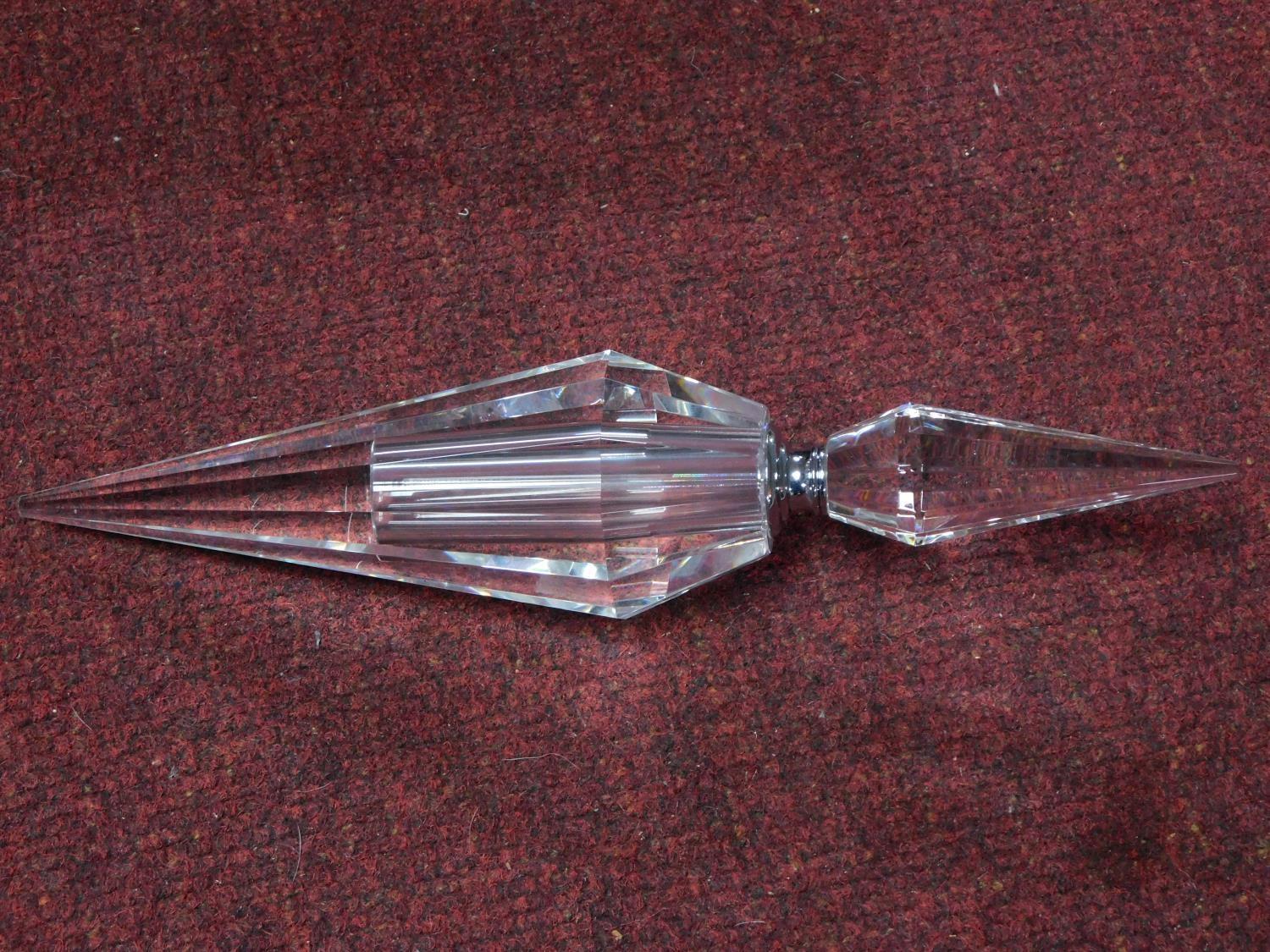 A contemporary Art Deco style faceted crystal conical shaped scent bottle with stopper. W.32cm