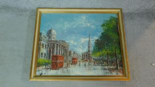 A framed oil on canvas of a London city scene, by Wildeboer, inscription verso. 70x58.5