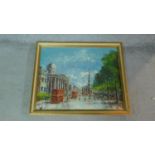 A framed oil on canvas of a London city scene, by Wildeboer, inscription verso. 70x58.5