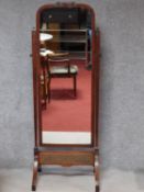 A mid 20th century mahogany swing framed cheval mirror. H.178 W.69cm