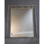 A mid 20th century white painted wrought iron pier mirror. H.105x90cm