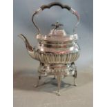 An antique Walker and Hall silver plate spirit kettle and stand. With dragooned detailing, scalloped