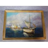 A gilt framed oil on canvas of fishing boats by T.L. Novaretti. 57x77.5