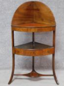 A Georgian mahogany corner washstand with undertier fitted with drawer on swept supports. H.111 W.59