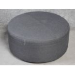 A grey upholstered Camerich Puck footstool. H.30 W.65 D.65cm