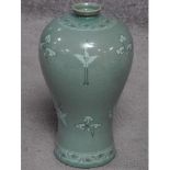 A 20th century Korean Blue celadon crackle glaze vase with crane and cloud decoration. Artist