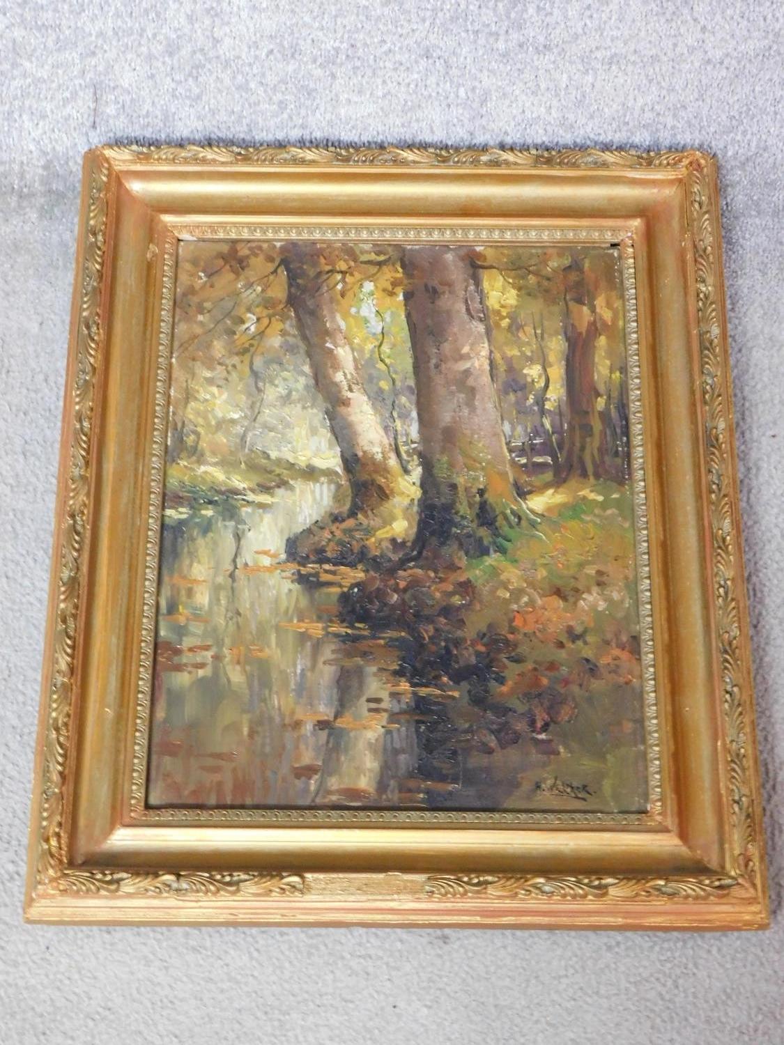 A gilt carved framed oil on canvas depicting a river in a forest. Jan Knikker signed alias Henk