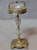 A vintage brass and glass pedestal ashtray. H.53cm