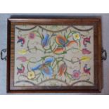 A mahogany framed and glazed converted tray to wall mounted embroidery. 53x42cm