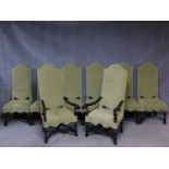 A set of eight William and Mary style dining chairs with upholstered arched high backs on turned and