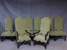 A set of eight William and Mary style dining chairs with upholstered arched high backs on turned and
