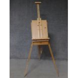 A beech framed fully articulated artist's travelling easel and box. H.56 W.41 D.20cm