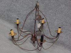 An antique style twisted brass five branch chandelier with a gilded finish. H.60 W.65cm
