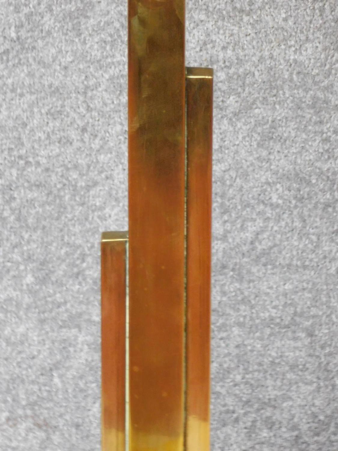 An Art Deco brass standard lamp of geometric outline and square stepped base resting on four block - Image 3 of 4