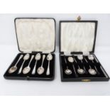 Two sets of cased coffee spoons. One cased set of silver Art Deco style coffee bean handled coffee