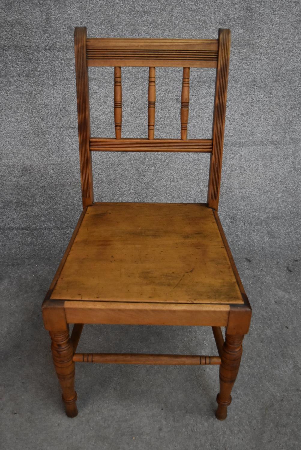 A set of four late 19th century beech framed dining chairs with panel seats. H.90x45cm - Image 3 of 4