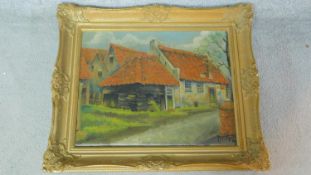 A gilt framed oil on canvas of a rural house, indistinctly signed. 54x64