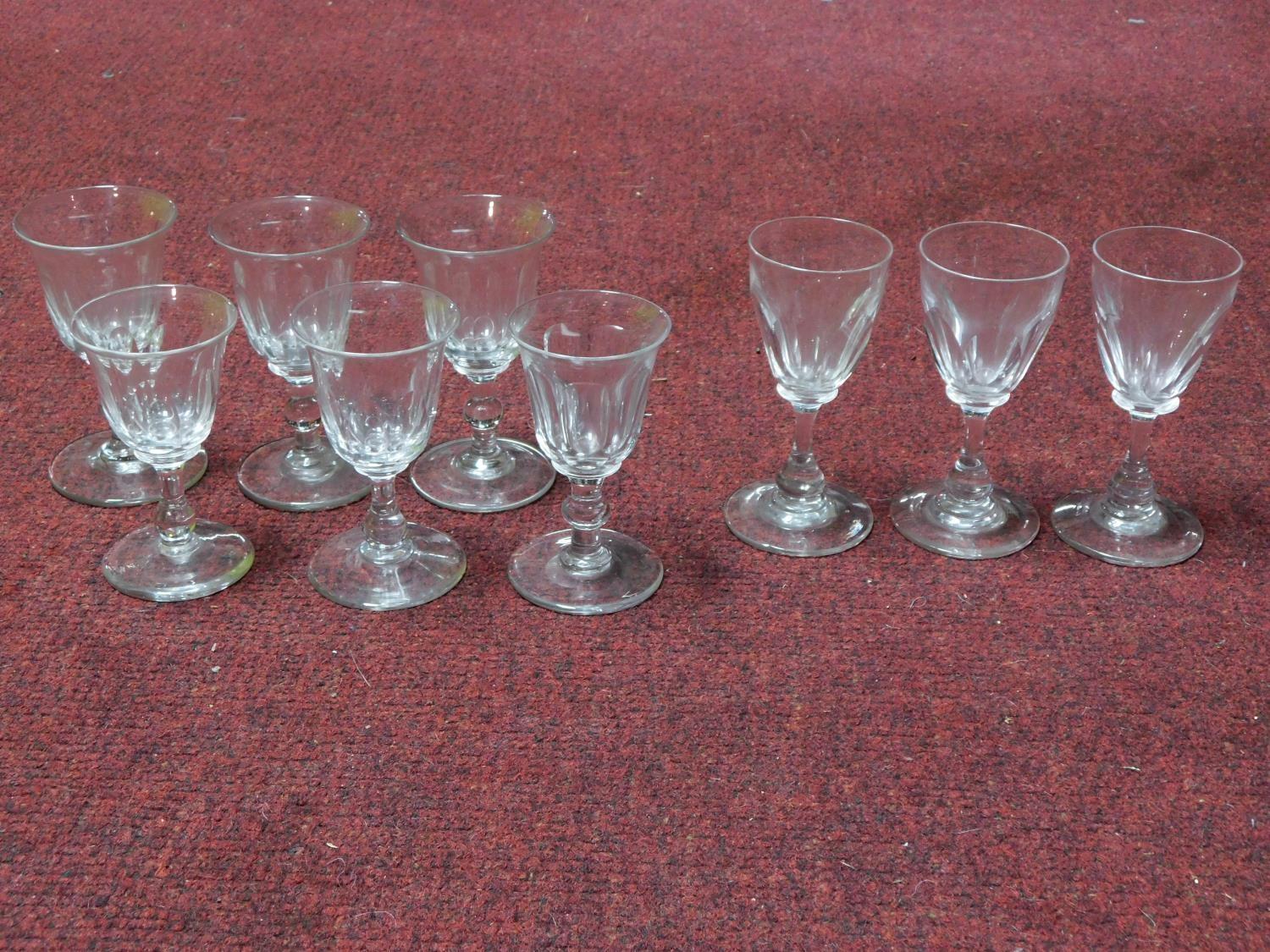 A set of six and a set of three antique blown glass cordial glasses with rough pontils.