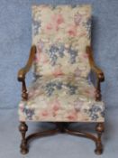 A William and Mary style walnut armchair on turned tapering stretchered supports. H.110cm