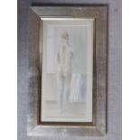A framed and glazed pastel of a naked woman, by Lindsey Bennett, inscribed to back. 28x46cm