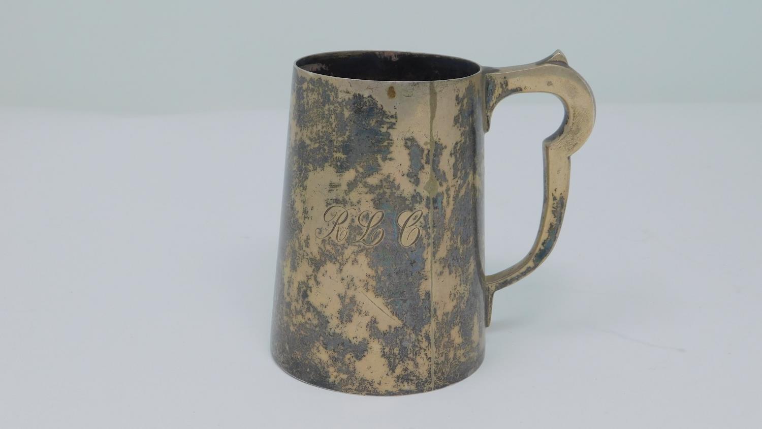 A sterling silver tankard with engraved initials 'RLC'. Hallmarked: AEP Co Ltd for A E Poston & Co