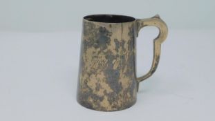 A sterling silver tankard with engraved initials 'RLC'. Hallmarked: AEP Co Ltd for A E Poston & Co