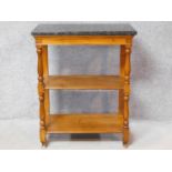 A marble topped fruitwood console table in the French Provincial style on turned front supports