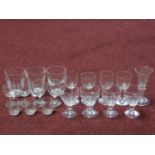 A collection of nineteen antique and vintage blown glass glasses. Including a set of four faceted