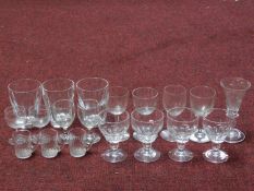 A collection of nineteen antique and vintage blown glass glasses. Including a set of four faceted