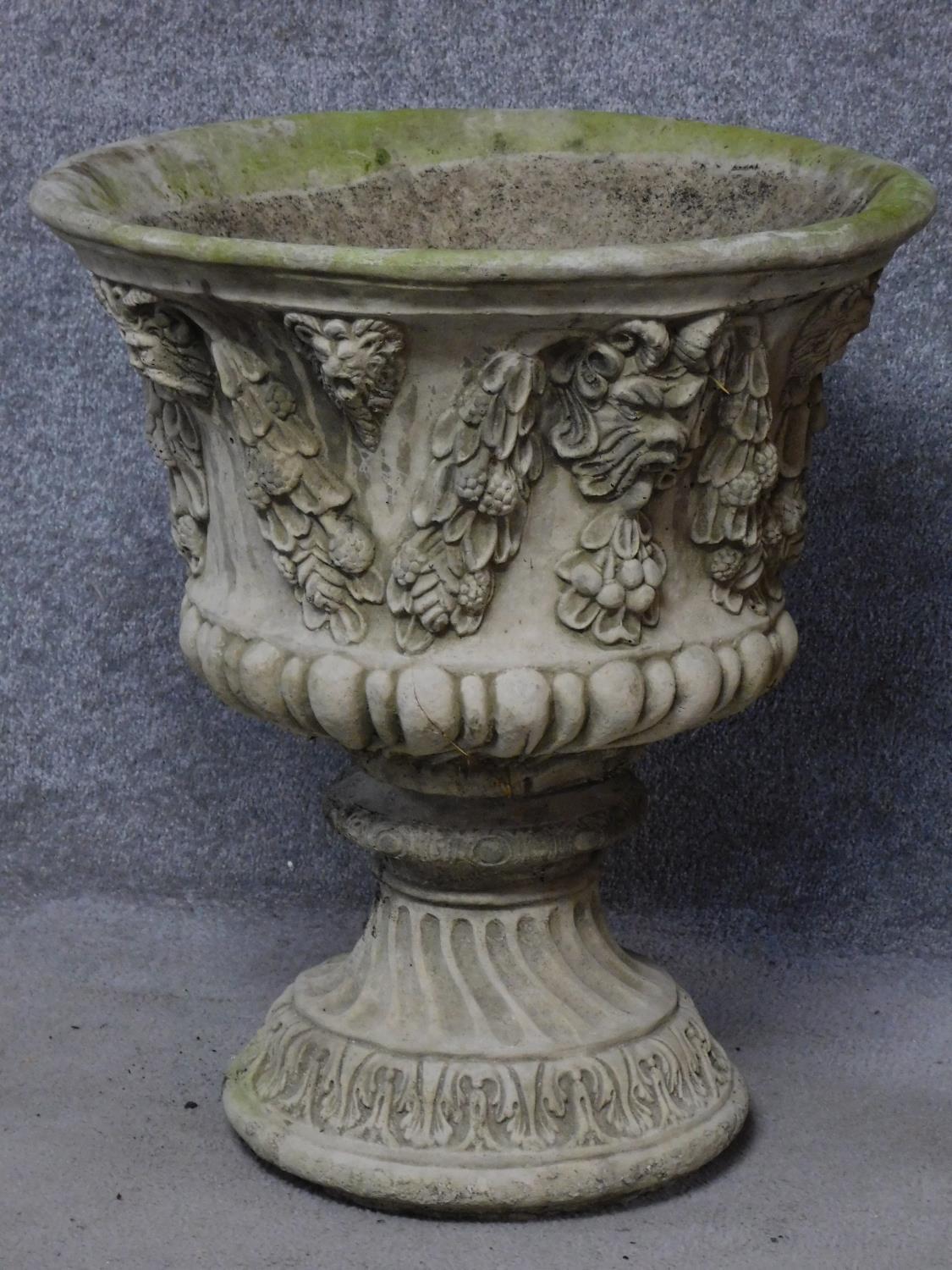 A pair of concrete campana form garden jardinieres with gargoyle and leaf garland decoration. H.58cm - Image 2 of 3