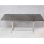A vintage smoked plate glass Pieff coffee table on chrome base. H.70 W.180 D.90cm
