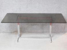 A vintage smoked plate glass Pieff coffee table on chrome base. H.70 W.180 D.90cm