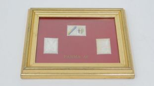 A set of framed and glazed enamelled white metal embossed stamps for Parma AC (Parma Calcio 1913).