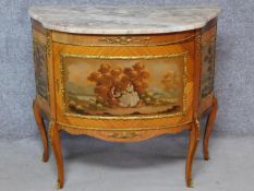A Louis XV Vernis Martin style marble top commode with ormolu mounts and painted panels on